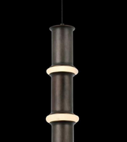 Dark brown pendant light with cylindrical design on a black background