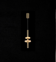 Modern pendant light fixture on a black background