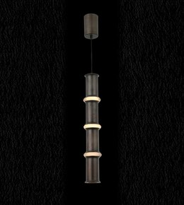 Modern pendant light with cylindrical design on a black background