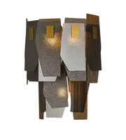 Modern wall sconce with geometric design on a white background