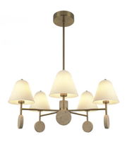 Modern chandelier with six lampshades on a white background