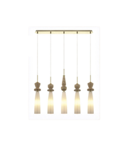 Modern pendant light fixture with five hanging lampshades on a white background
