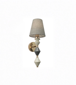 Wall sconce with geometric design and textured lampshade on a white background