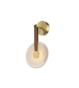 Wall-mounted light fixture with gold finish and glass shade on a white background