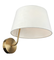 Wall-mounted lamp with white shade and gold arm on a white background