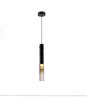 Modern pendant light with a black fixture and glass shade on a white background