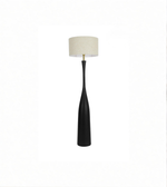 Floor lamp with a black base and beige shade on a white background