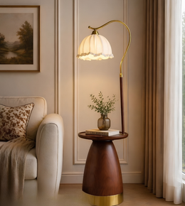 Decorative floor lamp with a wooden base in a living room setting.