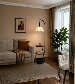 Cozy living room with a beige sofa, lamp, and plant