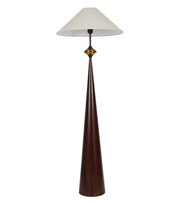 Tall floor lamp with a white shade on a white background