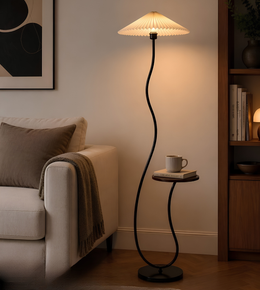 Modern floor lamp with a round table in a living room setting.