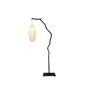 Modern floor lamp with black curved arm and white lampshade on a white background