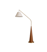 Floor lamp with a wooden base and white shade on a white background