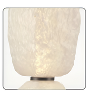 White textured table lamp on a white background