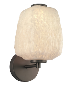 Wall-mounted light fixture with textured glass shade on a white background