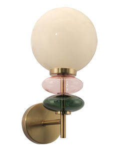 Wall sconce with round glass shades in beige, pink, and green on a white background