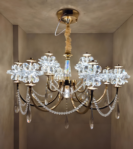Luxurious crystal chandelier hanging from a ceiling