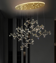 Decorative ceiling light fixture with intricate design in a dark room