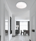 Modern waved edge LED ceiling light with textured acrylic border and frosted diffuser for bedrooms, hallways, kitchens, living rooms, and contemporary interiors.