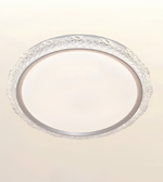 A round ceiling light fixture with a clear textured glass outer rim and a frosted white center, shown against a plain light beige background.