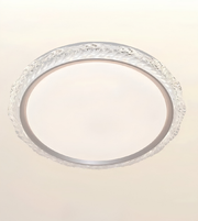 A round ceiling light fixture with a clear textured glass outer rim and a frosted white center, shown against a plain light beige background.