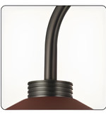 Close-up of a brown light fixture with a white border
