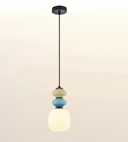 A modern pendant light fixture with a black metal rod and canopy, featuring stacked frosted glass shades in cream, light blue, and white, glowing against a soft beige gradient background.