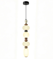 Pendant light with cylindrical design on a white background