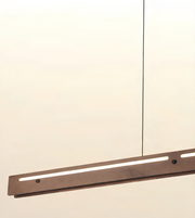 A modern linear LED pendant light with a dark wood-grain finish and a thin black suspension cord, shown against a plain off-white background.