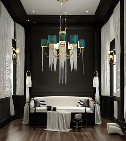 Modern living room with a chandelier, sofa, and decorative elements.