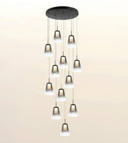 A modern multi-light chandelier with a circular black ceiling canopy and ten hanging bell-shaped frosted glass shades of varying sizes, shown against a plain light beige background.