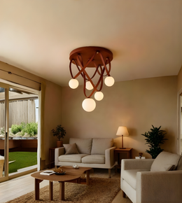 Modern living room with a ceiling light fixture, sofa, and coffee table.