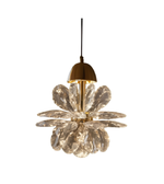 Gold pendant light fixture hanging from a ceiling