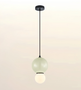A modern pendant light fixture with a matte black ceiling canopy and cord, featuring two stacked frosted glass globes, one pale green and one glowing warm white, shown against a soft beige gradient background.