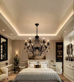 Black crystal chandelier with ornate curved arms and candle-style lights suspended above a bed in an elegant neutral-toned bedroom.