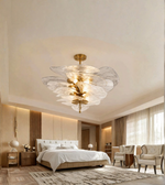 Glass petal pendant chandelier illuminating an elegant contemporary interior.