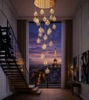 Elegant floral crystal cascade staircase chandelier by Daya Worldwide, featuring sparkling crystal details and a double-height design.