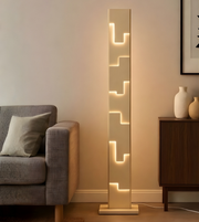 Modern architectural LED floor lamp with geometric stepped light design in living room