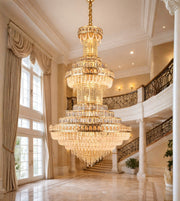 Royal heritage tiered glass crystal chandelier in a grand palatial double height interior