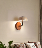 Natural material wall light in cozy bedroom setting