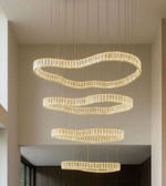Modern chandelier with multiple circular rings hanging from the ceiling.