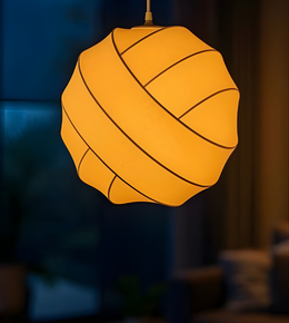 Yellow pendant light fixture in a dimly lit room