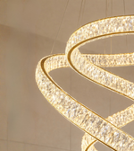 Elegant Daya Worldwide Aurelia Spiral luxury double height LED chandelier with intricate spiral design and warm lighting.