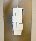 Modern geometric column pendant light by Daya Worldwide featuring sleek design and contemporary style, ideal for stylish interior lighting.