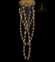 Luxury chandelier with floral designs on a black background, branded 'Dubai Lights'.