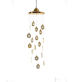 Decorative hanging light fixture with gold accents on a white background