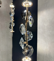 Chandelier with crystal elements on a dark background