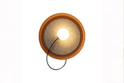 Round decorative wall light with globe bulb on white background