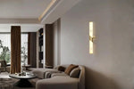 Luxury vertical wall light installed in a contemporary living room