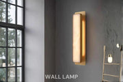 Linear wall light installed beside bed in contemporary bedroom